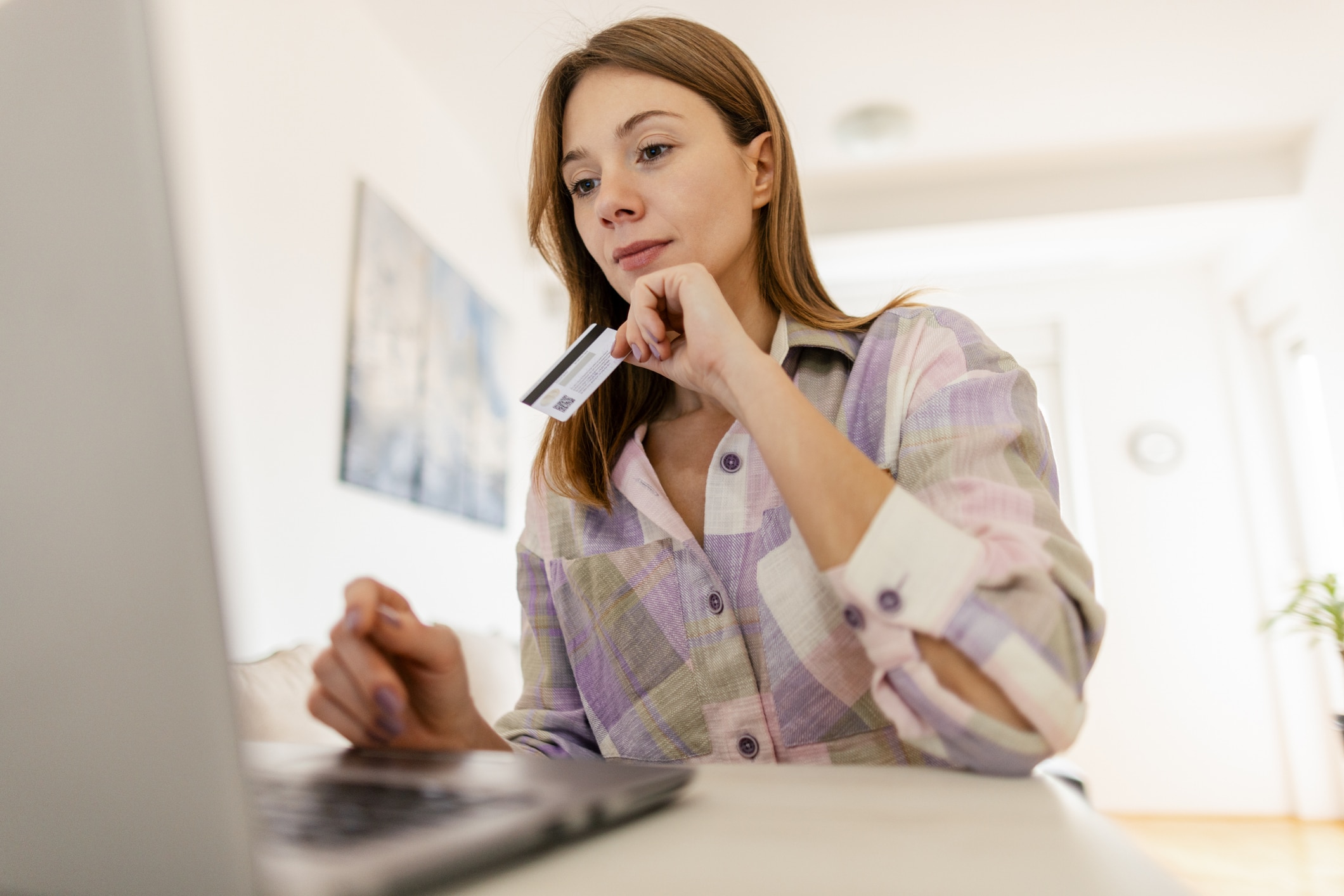 A Woman Shopping Online With Credit Card