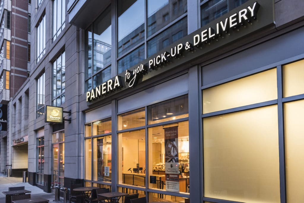 Panera Bread Restaurant Facade With Pick Up And Delivery Sign