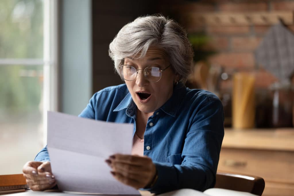 Close Up Overjoyed Woman Wearing Glasses Reading Letter