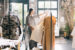 Customer loyalty: A female customer browses in her favorite clothing retail store.