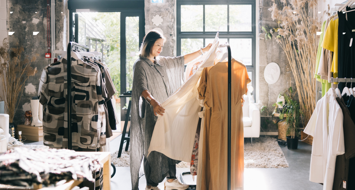 Customer loyalty: A female customer browses in her favorite clothing retail store.