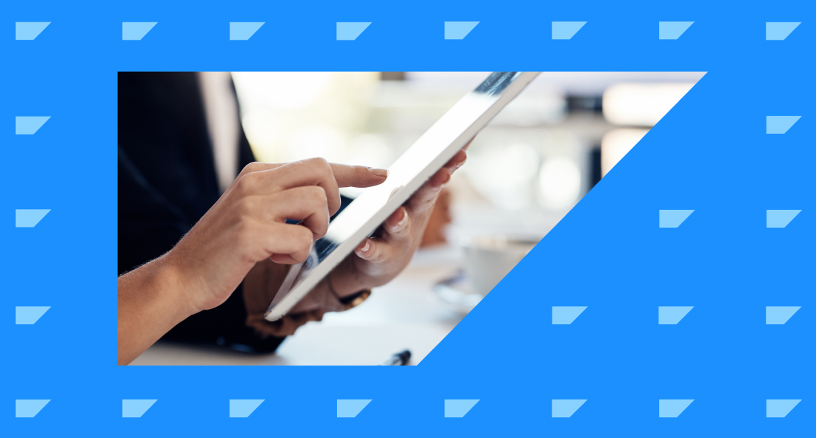 Marketer tapping a tablet screen