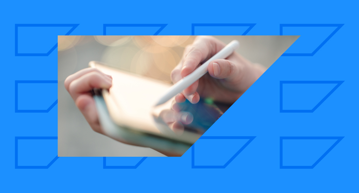 Marketer using a stylus on a tablet screen
