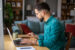 AI personalization in practice – a young man working at his laptop at a desk
