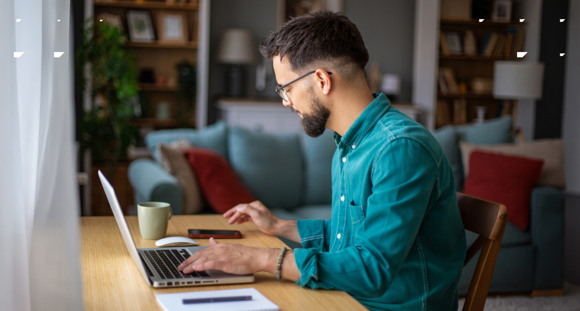 AI personalization in practice – a young man working at his laptop at a desk